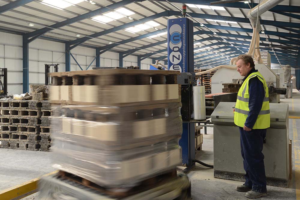 Dried Insulated Concrete Form units being wrapped by machine for delivery