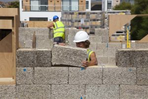 Construction worker Building with Durisol Insulated Concrete Form