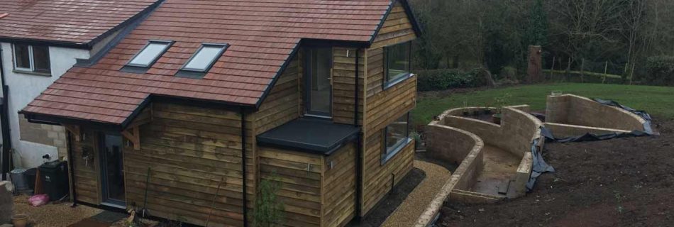 Photo of environmentall friendly extension to 19th century cottage built using Durisol UK ICF forms