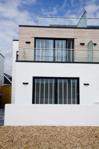 Exterior photo of seaside home built using insulated concrete form units from Durisol UK